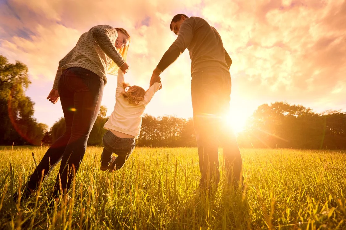 Family outdoors in natural setting